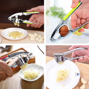 Prensa de ajo multifuncional de acero inoxidable, picadora de ajo, molinillo de ajo, triturador de jengibre y ajo para uso en la cocina; nuez - Product Image 1