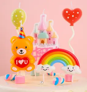 Candele adorabili di compleanno di topper della torta del fumetto di colore pastello divertente della candela di sorriso delle nuvole dell'arcobaleno