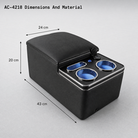 Foshan Carfu AC-4218 Boîte d'accoudoir arrière universelle pour voiture avec double porte-gobelets, LED bleue, USB et rangement, OEM, Vente en gros directe usine
