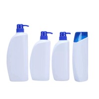 Bouteille en plastique incurvée bleue et blanche avec bouchon à vis d'une capacité de 150ml pour le marché des articles de toilette
