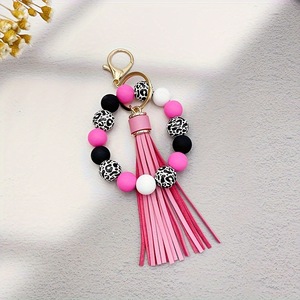 Bracelet créatif en silicone avec des perles rondes en alliage de léopard, impression UV, long pompon doux, cadeau écologique pour hommes et femmes - Product Image 4