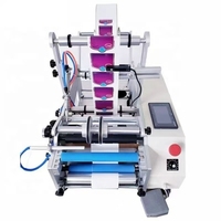 Machine d'étiquetage semi-automatique pour flacons de gouttes oculaires, flacons de liquides oraux et flacons pulvérisateurs avec étiquettes adhésives plates