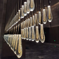 Lustre LED de plafond de luxe américain, moderne, unique, en forme d'ampoule, pour mariage, escalier, banquet, villa, hall, centre commercial
