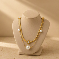 Collier pour femme avec pendentifs en forme de cœur croisé, chaîne en bambou rétro, design minimaliste, orné de perles, style mode transfrontalier
