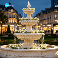 Grande fontaine d'eau commerciale européenne moderne et durable en pierre et marbre beige à niveaux, avec garantie d'un an pour utilisation en extérieur dans les jardins