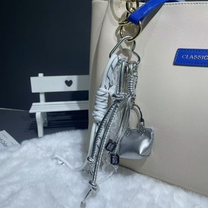 Porte-clés DIY fait main en cuir artificiel et alliage de zinc, breloque de sac portable, design irrégulier Printemps 2025 - Product Image 2