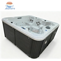 Baignoire de massage à remous autoportante en acrylique, chauffée, avec jupe décorative, pour spa, avec jets d'air, éclairage coloré, cascade et commande numérique
