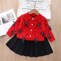 Ensemble de deux pièces en tricot pour filles, nouveau style, avec cardigan décoré d'un nœud pour les bébés filles