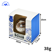 Chocolat noir au cacao, caramel salé, chocolat chaud personnalisé, bombe chocolatée, boîte bleue et blanche, chocolat sucré
