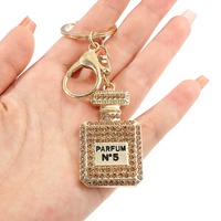 Bouteille de parfum diamant pendentif porte-clés Logo personnalisé strass parfum voiture porte-clés breloques sacs à dos porte-clés Offre Spéciale