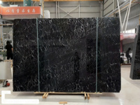Dalles de marbre noir veiné de luxe, carreaux de marbre noir naturel effet toile d'araignée pour mur d'accentuation de salon et table basse