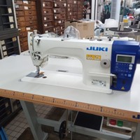 Machine à coudre à point droit à une aiguille JUKIS DDL-7000A d'occasion avec coupe-fil automatique, légère pour le denim