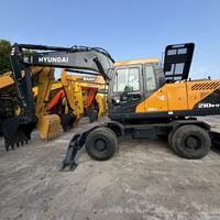 Promotion : Excavatrice sur pneus Hyundai d'occasion, modèle 210W-9T