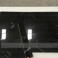 Carreaux de marbre noir poli gris naturel au design moderne pour salle de bain, salon, villa, usage intérieur