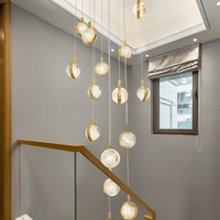 Lustre long en cristal de luxe léger pour villa duplex, design créatif et personnalisé, idéal pour chambre à coucher, chevet, restaurant, bar, escalier