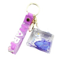 Porte-clés créatif Kevin en acrylique violet avec liquide et sable mouvant, breloque de sac et de voiture, pendentif bouteille flottante