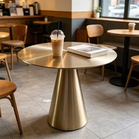 Table basse de luxe en acier inoxydable pour usage commercial, table à manger minimaliste pour hôtel, café, restaurant