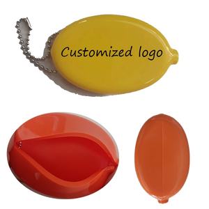 Monedero ovalado para apretar en blanco de goma de Pvc con logotipo personalizado con llavero para bolso y regalo de Promoción Comercial - Product Image 1