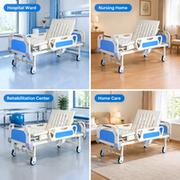 Lit médical à double manivelle pour soins à domicile, sections dossier et repose-jambes, manuel, avec plateau ventilé en ABS, insert bleu, rails pliants et roulettes verrouillables