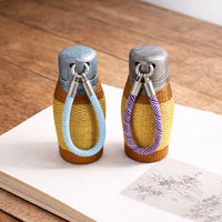 Bouteille isotherme en titane pur de qualité supérieure avec manchon en bambou tressé à la main et fil doré, style vintage, cadeau d'affaires