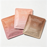 Sachets personnalisés imprimés en feuille métallisée à usage unique avec encoche de déchirement pour échantillons de shampoing, après-shampoing et produits capillaires