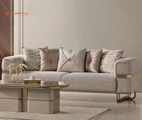 Canapé de luxe moderne en tissu haut de gamme avec décorations et pieds dorés, fourni directement par le fabricant pour le salon