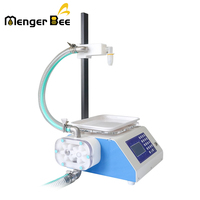 Machine de remplissage semi-automatique électrique de haute précision pour petites quantités de miel, de boissons, de shampoing et d'huile