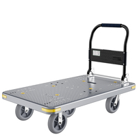 Chariot à plateforme en plastique robuste à quatre roues pliable pour le transport de marchandises industrielles