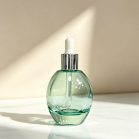 En stock, flacon compte-gouttes rond en verre de 50 ml, flacon de recharge pour sérum d'huile essentielle pour le visage