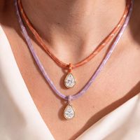 CAIOOCHE Collier pendentif tressé délicat avec perle en oxyde de zirconium, cordon coloré personnalisé rose et bleu, plaqué or, bijoux pour femmes en gros