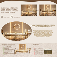 Comptoir de présentation de bijoux en acier inoxydable de luxe, vitrine en verre sur pieds hauts pour boutique de bijoux haut de gamme, vitrine vintage à LED