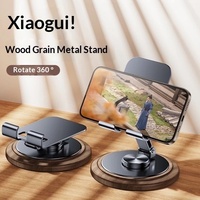 Penyangga Ponsel & Tablet Mekanis Putar Lipat Portabel Multifungsi Pengangkat Live Streaming Alas Kayu Motif Serat Kayu