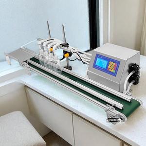 モデル4H3200小型液体ボトル500ml飲料油バイアルバッグ包装機130cmコンベヤー220v水ガラス材料 - Product Image 3