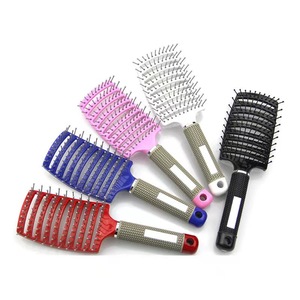 โรงงานโดยตรงขนาดใหญ่หวีโค้งซี่โครงกลวงแปรงผมพร้อมแผงนิ่มขายส่งไนลอนหวีนวดผม - Product Image 1