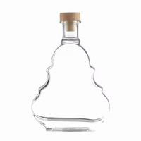 Bouteilles en verre vides personnalisées transparentes pour la validation des emballages de nouveaux produits (bourbon, vodka, spiritueux)