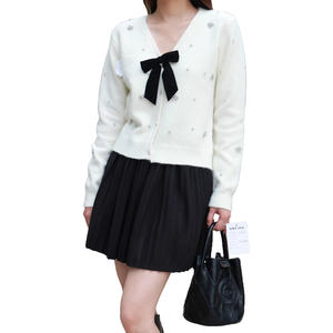 <span class=keywords><strong>V</strong></span>êtements féminins transfrontaliers pour le commerce extérieur : Cardigan à col en <span class=keywords><strong>V</strong></span>, <span class=keywords><strong>pull</strong></span> en maille à nouer avec nœud floral, doublure en laine, vente en gros - Product Image 5