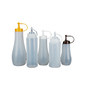 240ml & 500ml <b>squeeze</b> <b>bottles</b> with measuring scales for ketchup and salad dressing, made of plastic. - Product Image 1