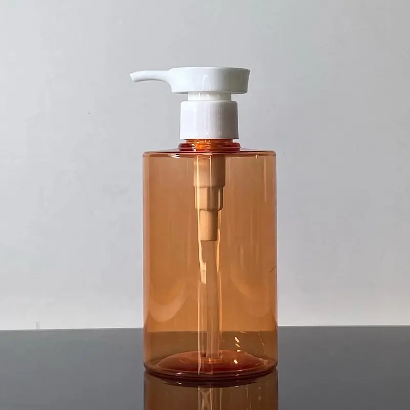 Özel etiket yuvarlak düz omuz 300 ml 400 ml PET plastik kozmetik şampuan şişeleri için losyon pompası ile