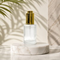 Flacon en verre givré mat de 30 ml avec bouchon doré métallique pour sérum de soin de la peau
