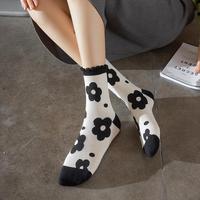 Chaussettes courtes pour femmes, nouvelle collection automne, jetables, écologiques, en coton, chaudes, antidérapantes, à motifs noir, fleur, carreaux, visage amusant, cœur, style uni