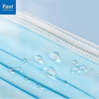 Masque facial de protection jetable 3 plis non tissé respirant imperméable antibactérien pour les soins de santé