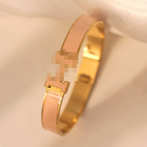 Bracelet en acier inoxydable plaqué or et argent - Cadeau unisexe tendance pour anniversaire avec lettre H sertie dans un cadre certifié - Product Image 1