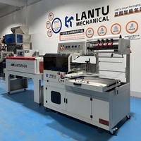 Machine de découpe et de scellage de film rétractable entièrement automatique FQL550V pour l'emballage de boîtes de produits