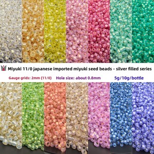 Cuentas de Vidrio <span class=keywords><strong>Miyuki</strong></span> Japonesas Importadas de 2mm 11/0 con Forro Plateado, 10 Gramos/Botella, para Materiales de Bisutería Hechos a Mano - Product Image 1