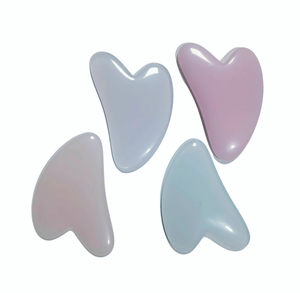 Productos de masaje guasha de resina con forma de corazón para lifting facial a precio mayorista bajo - Product Image 1