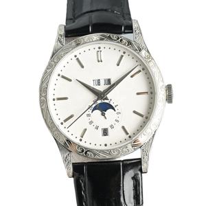 Montre unisexe élégante et luxueuse 2026 avec cadran multifonction à motif sculpté, calendrier et index incrustés de diamants - Product Image 1