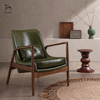 Fauteuil de salon moderne en bois massif et cuir pour la lecture et la relaxation