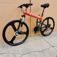 Vélo pliant exporté de Chine, avec suspension verrouillable, cadre rigide en alliage d'aluminium, 26 pouces, adapté au trajet quotidien et au VTT, unisexe