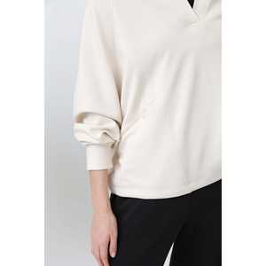 เสื้อสเวตเชิ้ตแบบอสมมาตรสำหรับผู้หญิง ถักทอระบายอากาศได้ดี สีขาว แขนยาว สำหรับใส่ลำลอง - Product Image 1