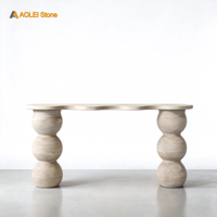 Table console moderne en marbre travertin beige avec pieds sphériques empilés uniques, idéale pour la décoration de couloirs et de salons de luxe.